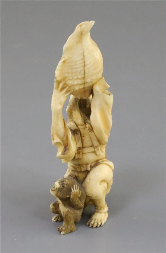 A Japanese ivory okimono of a Yamabushi Tengu, Meiji period, H. 11.8cm